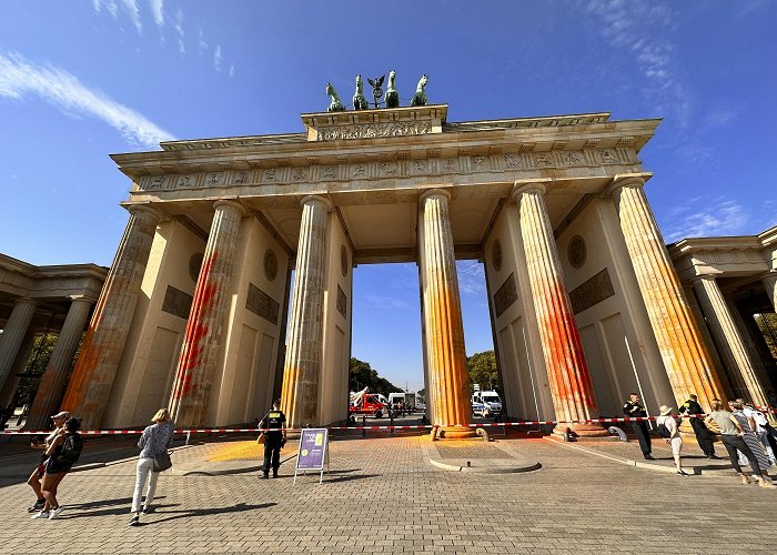 Brandenburg Gate Climate activists spray Berlin's Brandenburg Gate with orange ... photo